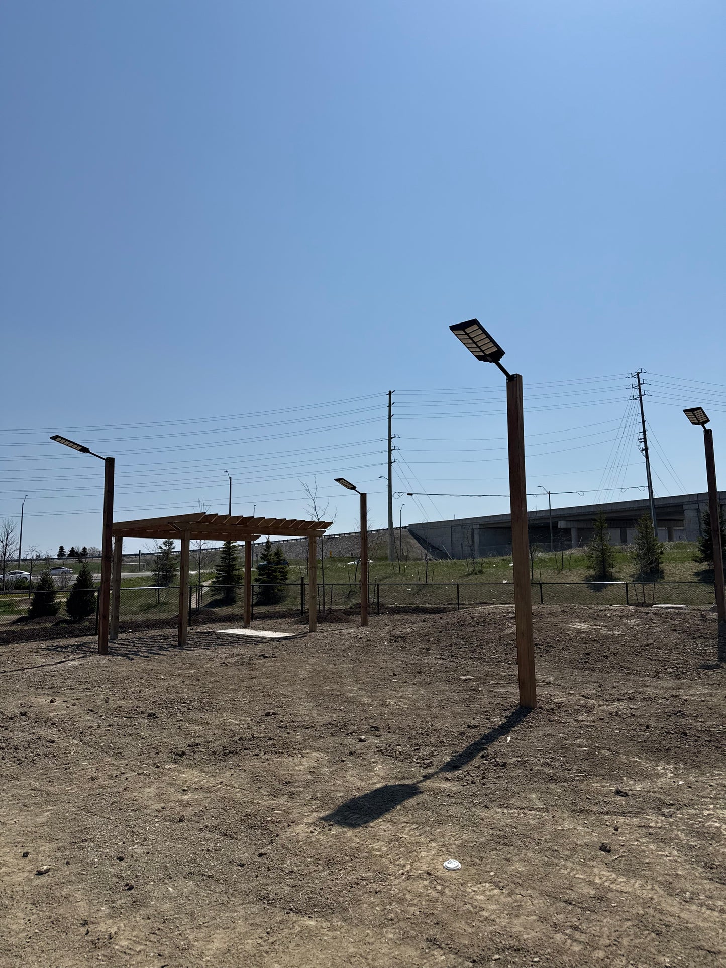 BigM 1200W solar commercial street lights are installed at a Loblaw’s dog park at Barrie, Ontario
