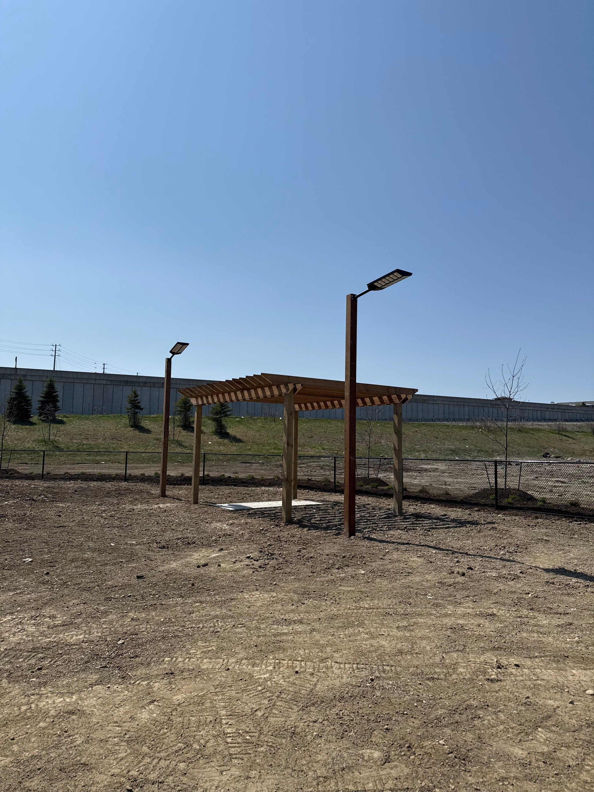 BigM 1200W solar commercial street lights are installed at a Loblaw’s dog park at Barrie, Ontario to ensure safety for dog owners and their beloved pets.