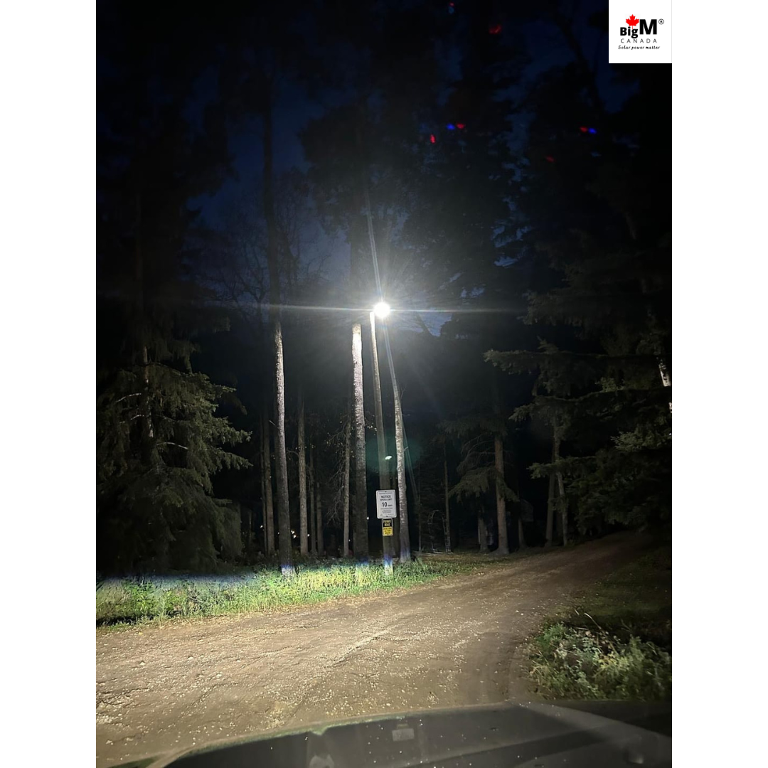 BigM 1200W solar commercial street lights installed on an off-grid road, providing bright illumination at night.