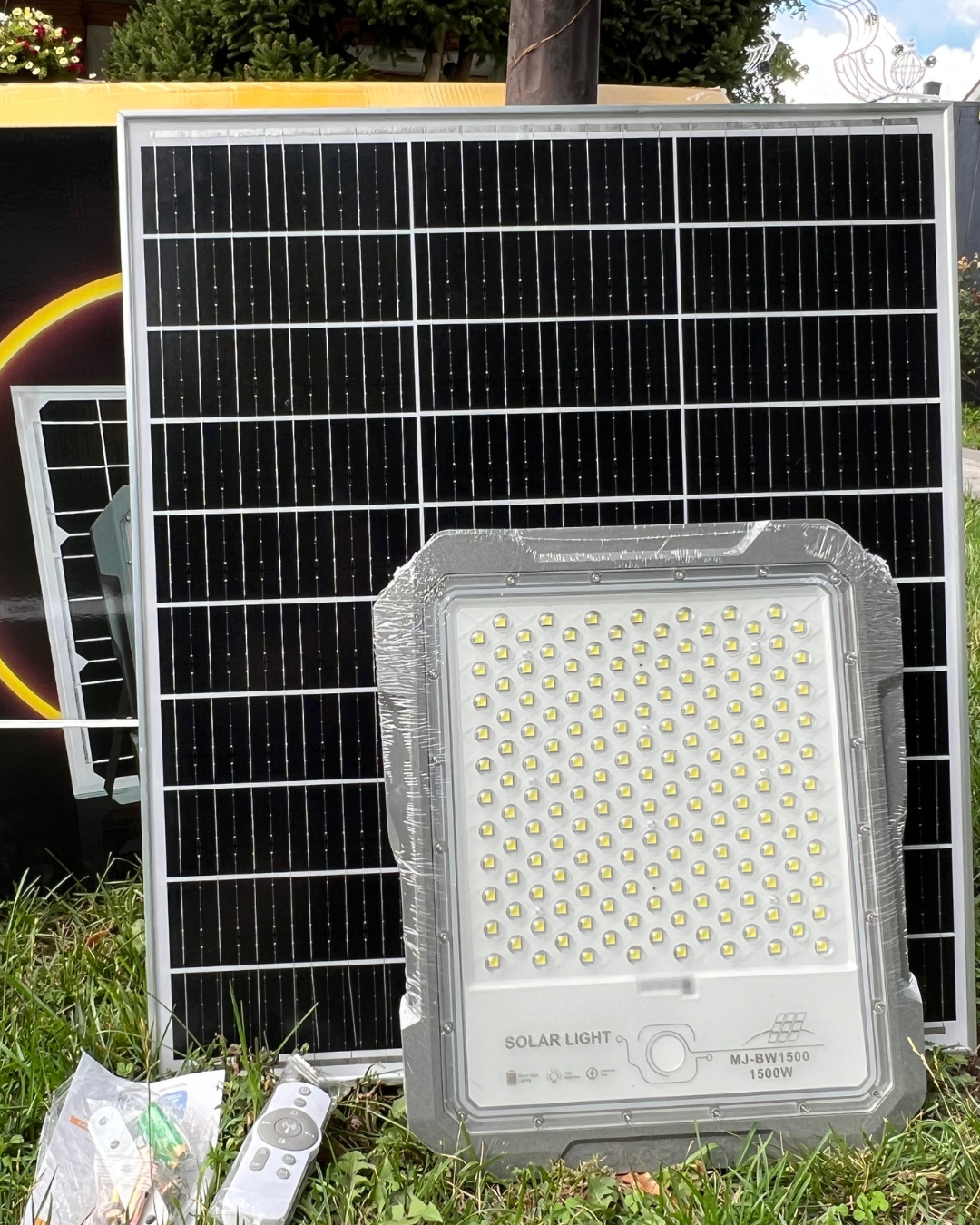 BigM 1500W High Lumens Solar Flood Light with a large solar panel, LED array, and adjustable mounting for outdoor sports and large-area illumination.