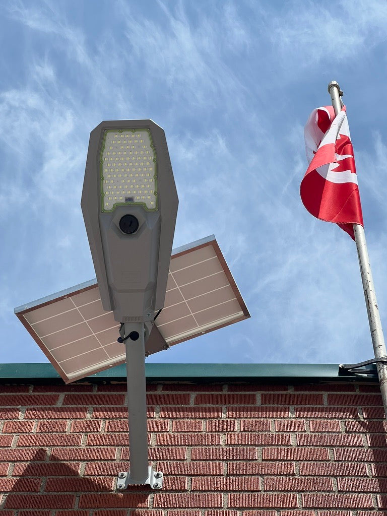 BigM 600W aluminum solar street light with motion sensor & adjustable panel Is installed at the exterior of a commercial building at Woodstock, Ontario.