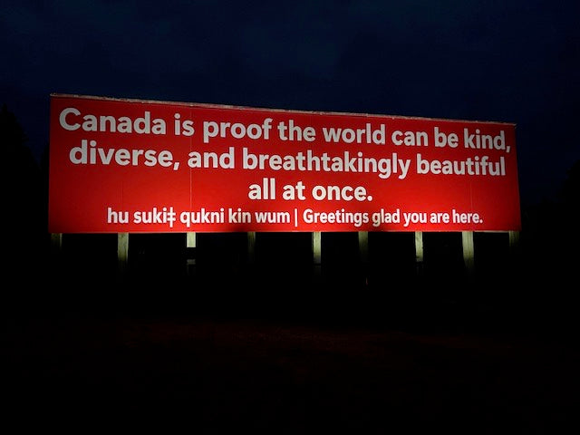 3 units of BigM 300W luminum cast solar floodlights are installed to illuminate a 32 ft wide x 8 ft high billboard showcasing positive Canadian values at CRESTON, BC