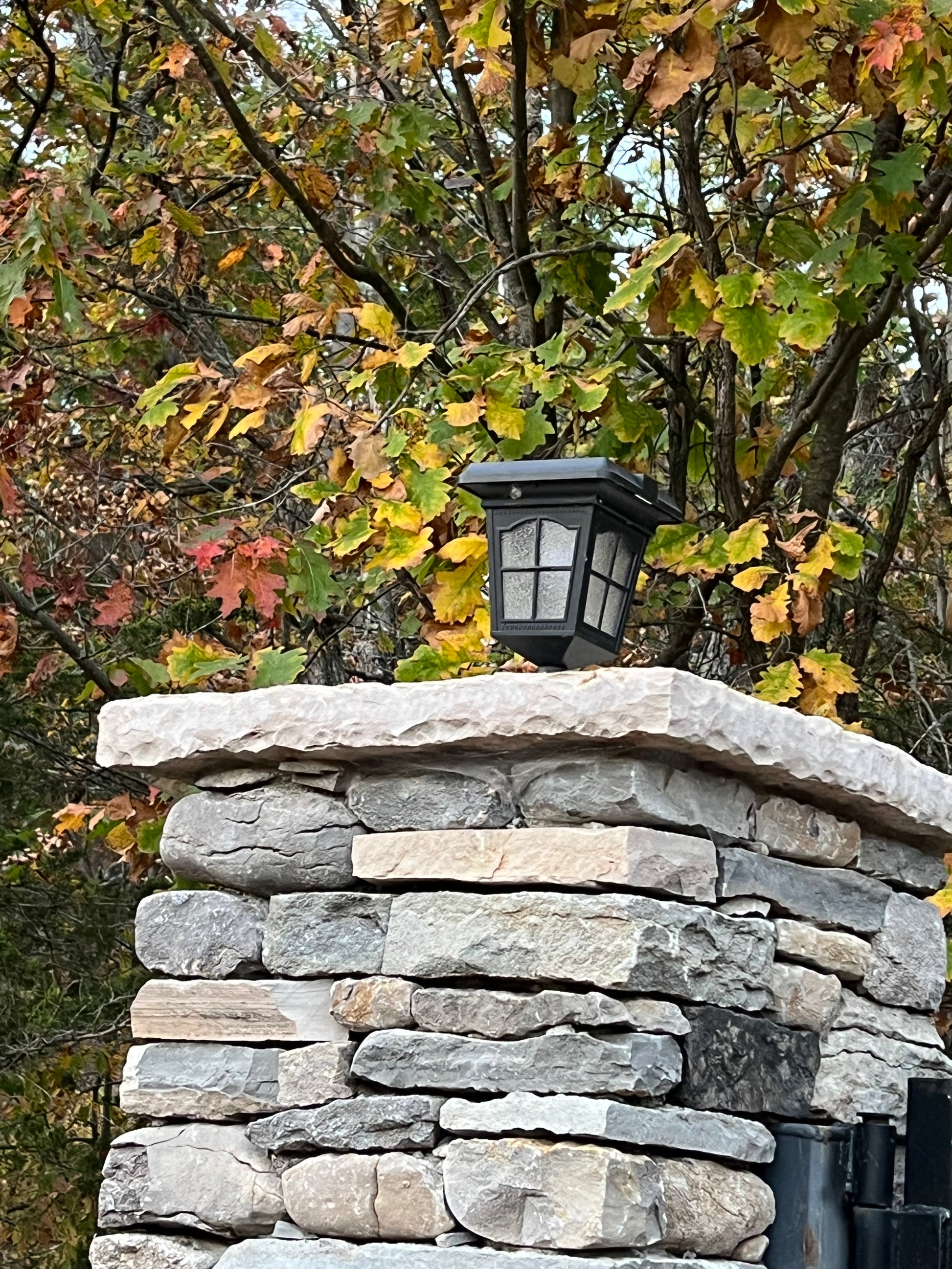 BigM Elegant Looking Vintage Style Solar Post Lights installed on a stone pillar at a wedding venue