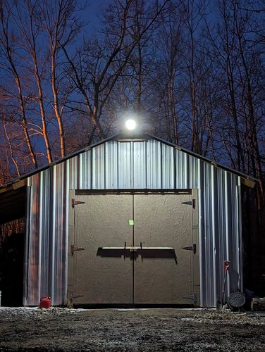 Night view of BigM 80W Solar Street Lights with Aluminum Body Adjustable Solar Panel