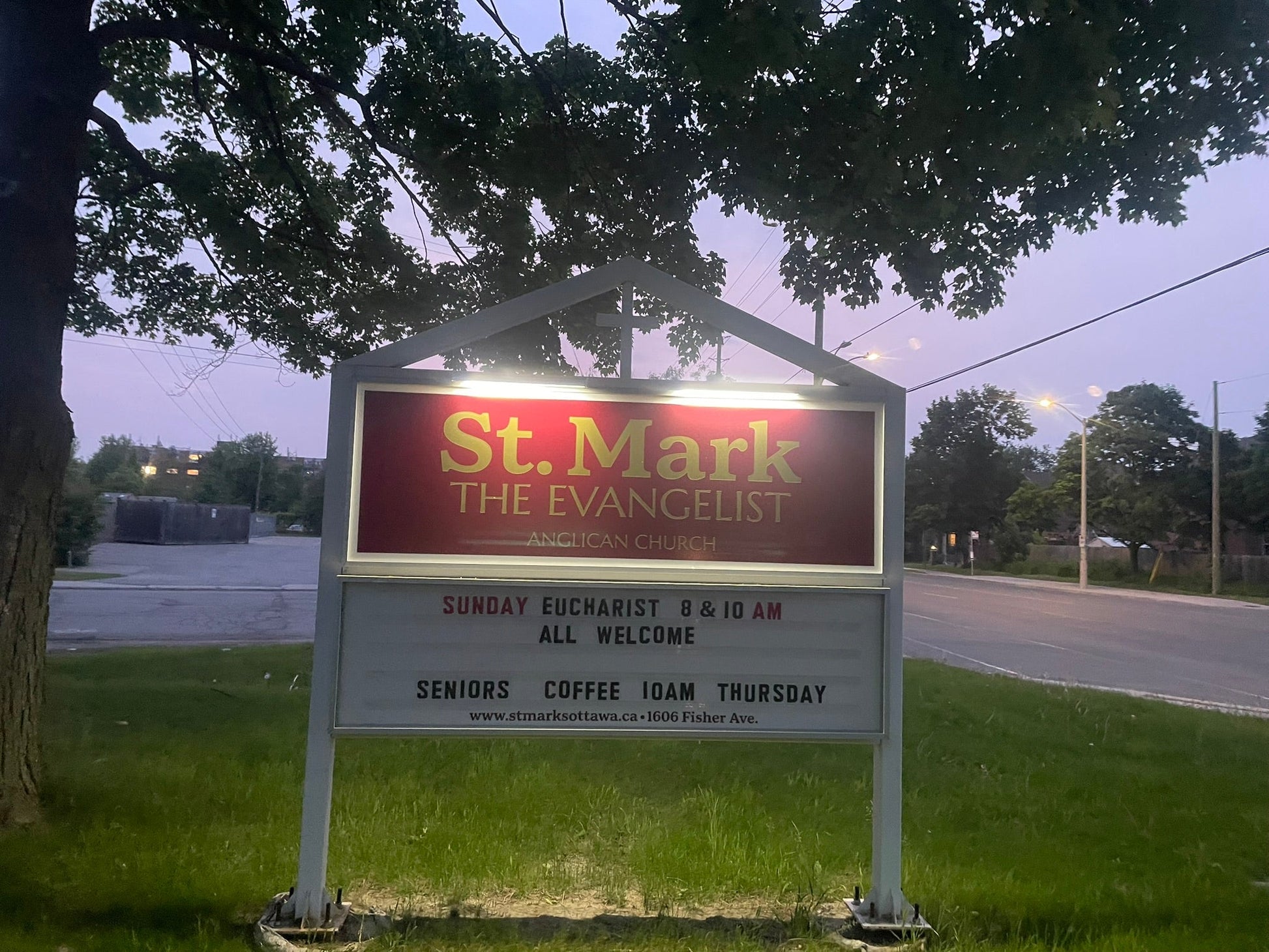 The BigM 24” Solar Billboard Lighting is mounted  at the top of  a church sign at Ottawa, providing bright, energy-efficient illumination at night.