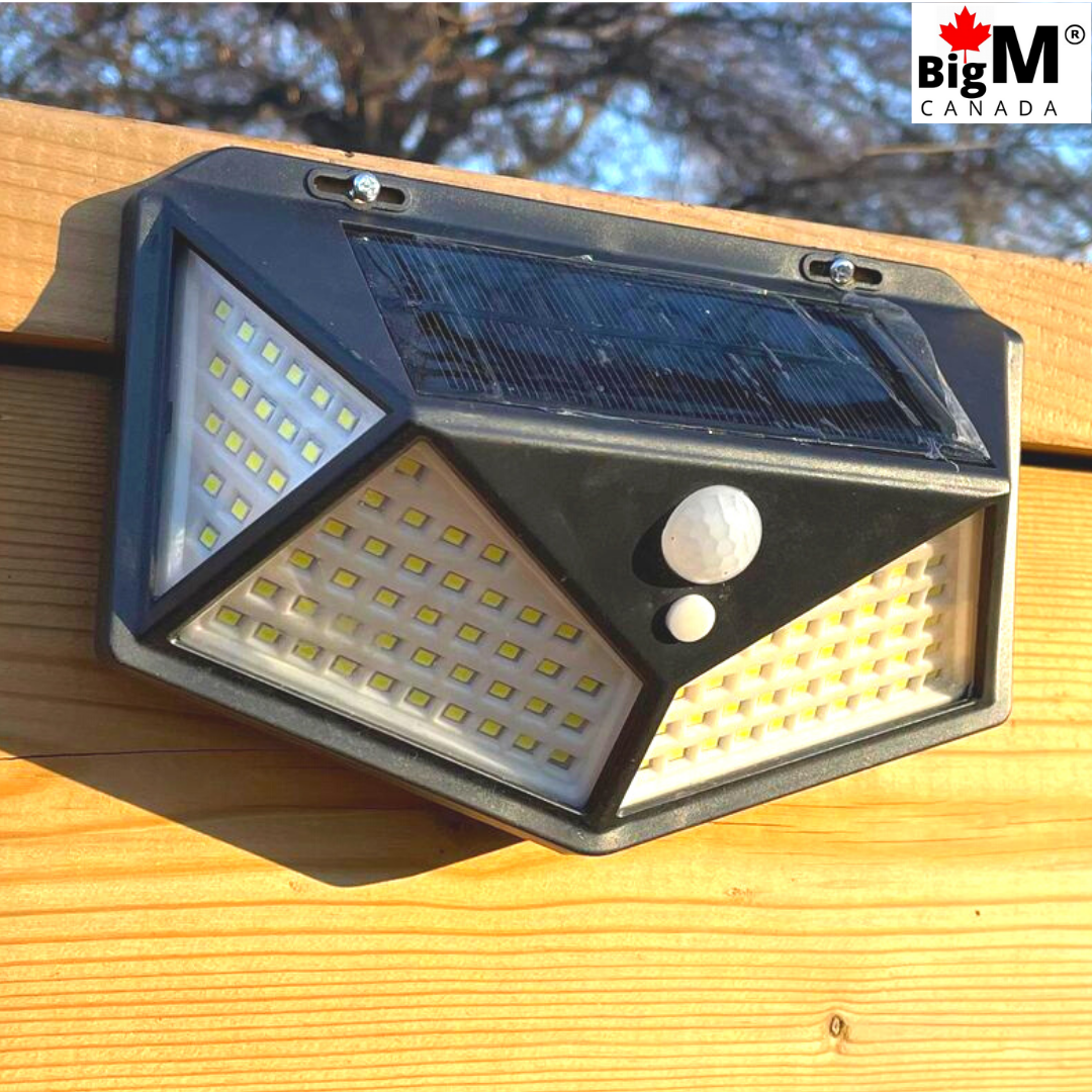 Side view of BigM Super Bright 114 LED Solar Motion Sensor Lights installed on a outdoor fence post