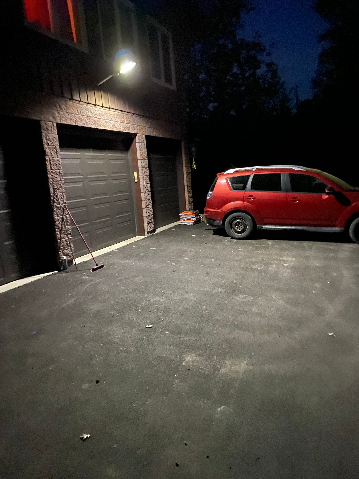Customer installed a BigM Heavy Duty 500W Solar Flood above a 3 doors garage
