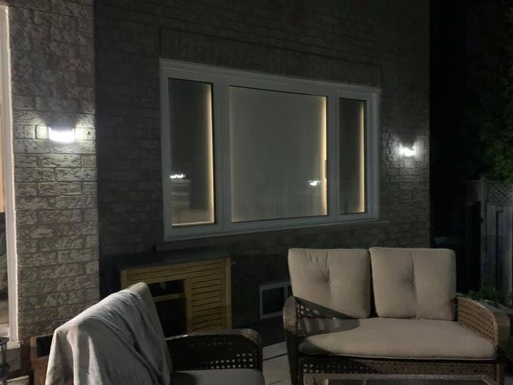 BigM  212 LED Solar Security Light is installed at the sitting area on a deck