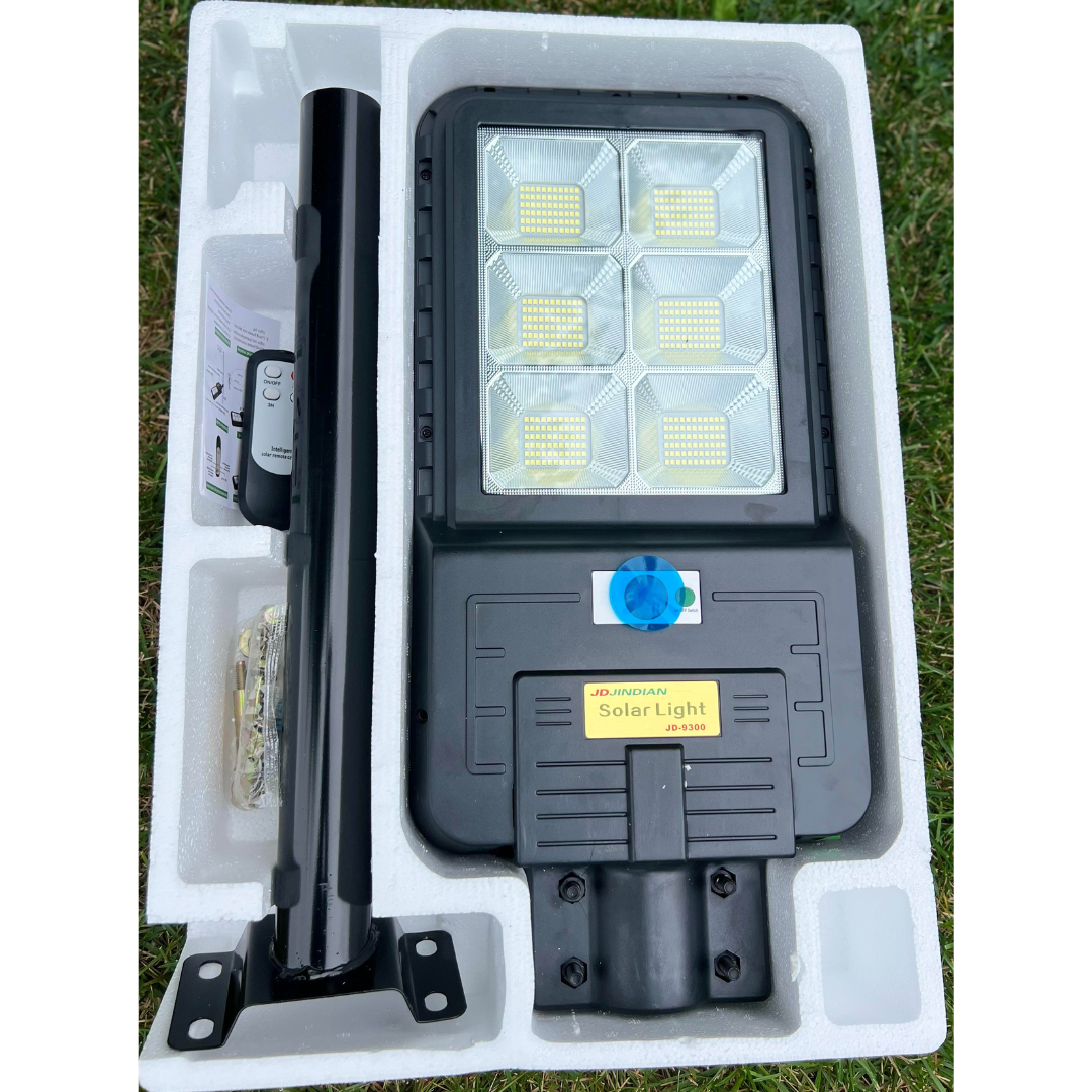 Image of BigM 300w Solar Street Light With metal handle, remote, hardwares, instruction guide comes in a styrofoam box to ensure product safety during shipping