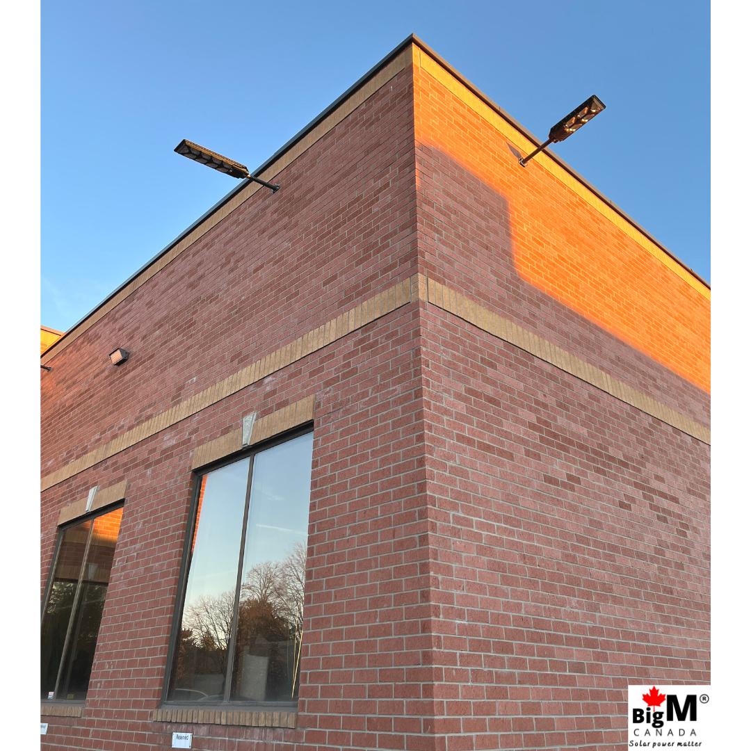 Image of BigM 900W Commercial Grade Solar Street Lights installed at the exterior of a commercial building
