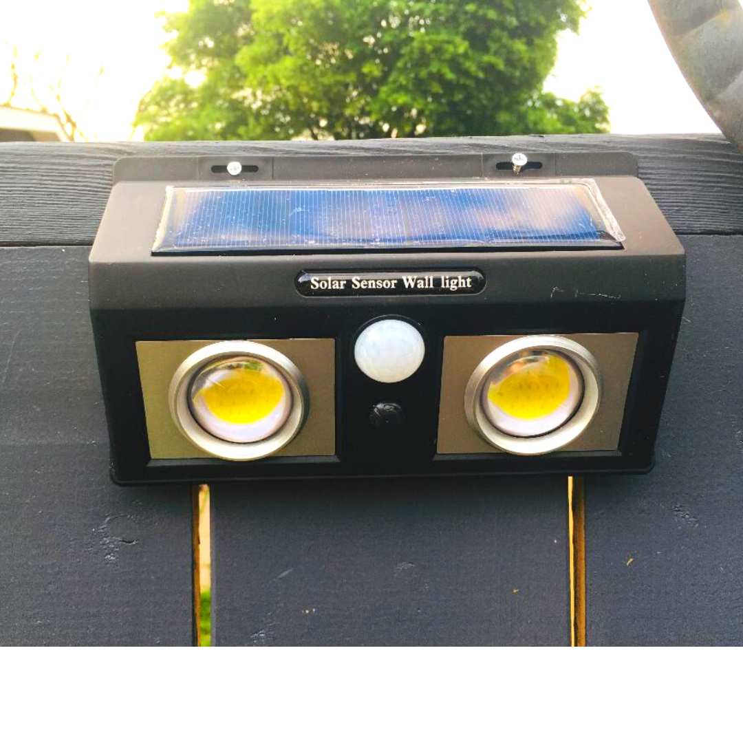 BigM 1000 Lumens Super Bright Outdoor Solar Lights with Motion Sensor installed  on the driveway of a house