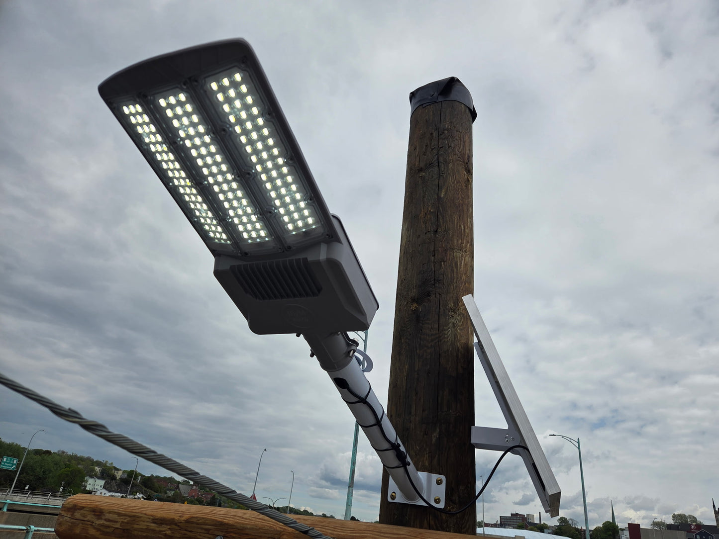BigM 800W 30000 High Lumens Solar Flood Light with Aluminum body installed on the top of a replica ship, lights up eau at night