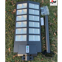 Load image into Gallery viewer, BigM 1200W solar commercial street lights for parking lots is considered as the Canada&#39;s brightest solar street light
