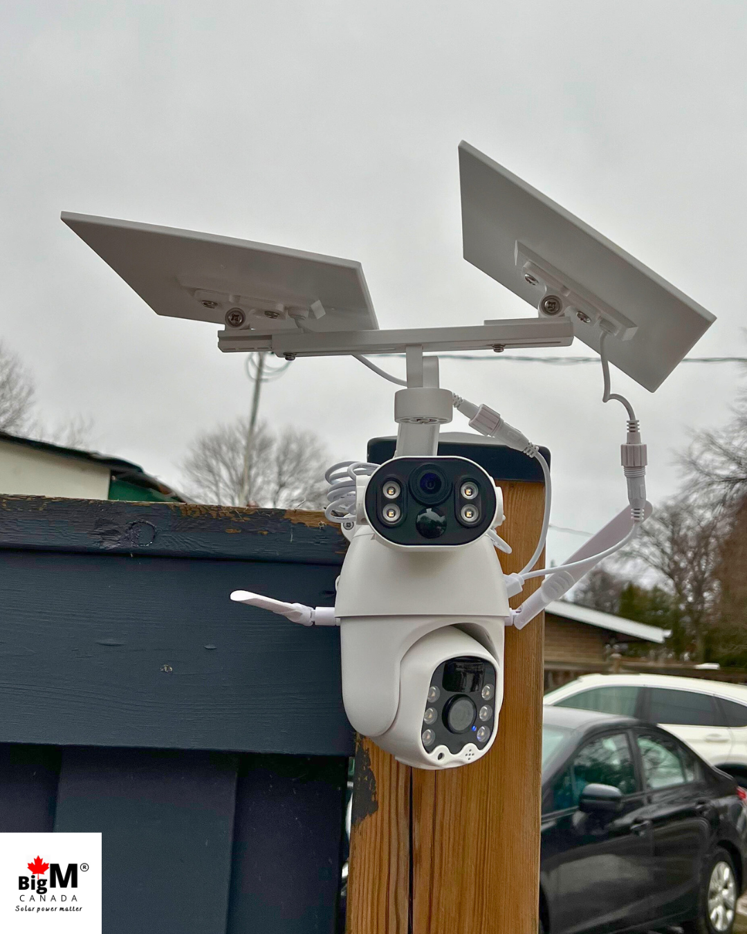 BigM Solar dual lens PTZ Security Camera with Wi-Fi option installed on ta post on the driveway of a house
