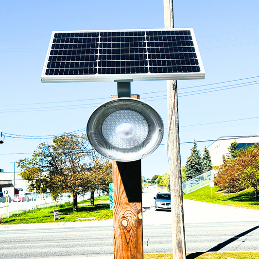 BigM Solar Pathway Light installed on a 6x6 post in a parking lot