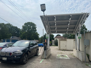BigM 900W LED Commercial Solar Flood Lights for Outdoors is installed at an EV charging station