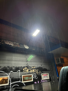 BigM heavy duty 500w Solar Street Lights installed at the front door of a automobile mechanic shop and generates bright light at nightbright light