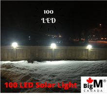 Load image into Gallery viewer, Image of a BigM Super Bright Wireless 100 LED Solar Lights with Motion Sensor generate bright light on a driveway
