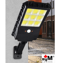 Load image into Gallery viewer, BigM 100 W solar street light installed at the front of a business location
