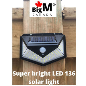BigM Bright 136 LED Solar Security Light is installed at the backyard of a house