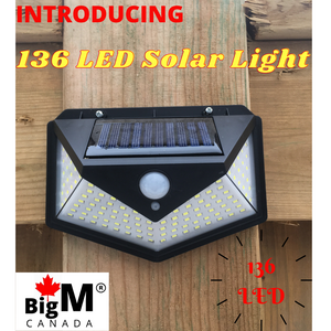 BigM Bright 136 LED Solar Security Light is installed on the pathway of a house