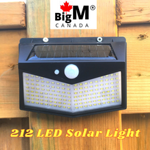 Load image into Gallery viewer, BigM  212 LED Best Solar Security Light is installed on the fence post
