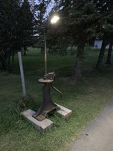 Load image into Gallery viewer, Night view of BigM 100 w street light that being installed by customer in a park
