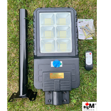 Load image into Gallery viewer, Image of BigM 300w Solar Street Light With metal handle, remote, hardwares, instruction guide
