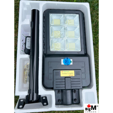 Load image into Gallery viewer, Image of BigM 300w Solar Street Light With metal handle, remote, hardwares, instruction guide comes in a styrofoam box  to ensure product safety
