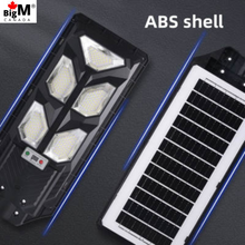 Load image into Gallery viewer, BigM 900W Commercial Grade Solar Street Lights are made of high quality ABS shell and high efficiency large solar  panel
