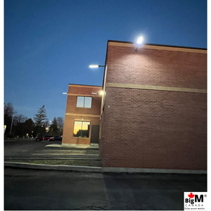 BigM 500w and 900w led solar street lights installed around a commercial building