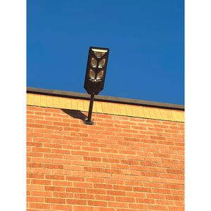 Image of a beautifully designed BigM 500w solar street lights installed at the exterior of a commercial building