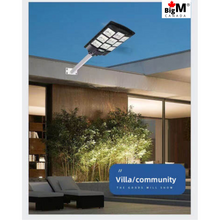 Cargar imagen en el visor de la galería, Image of BigM Heavy Duty 900W LED Best Solar Street Lights installed 0n a driveway of a house
