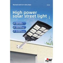 Load image into Gallery viewer, Image of BigImage of BigM Heavy Duty 600W LED Best Solar Street Lights with measuremenntsM Heavy Duty 900W LED Best Solar Street Lights with a metal pole installed on a wall
