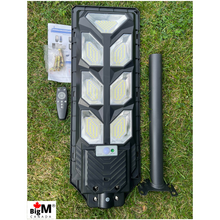 Charger l&#39;image dans la galerie, BigM 700W LED Solar Street Light With Remote, Metal Handle, Motion Sensor For Parking Lot, Park, Farm, Camp, Off-grid Area

