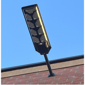 BigM 900w led solar street lights installed around a commercial building