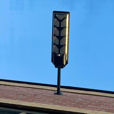 Image of BigM 900W Commercial Grade Solar Street Lights installed at the exterior of a commercial building