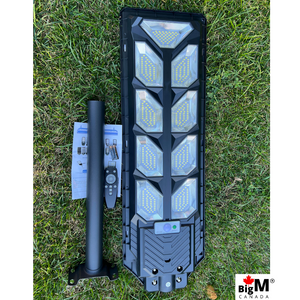 Image of BigM 900W Commercial Grade Solar Street Lights  with metal pole, remote, hardwares & instruction guide