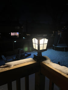 BigM Elegant Vintage Style Solar Post Lights for Outdoors lights up elegantly at night on a deck