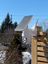 Load image into Gallery viewer, BigM solar security camera is installed by customer at the exterior of their cottage
