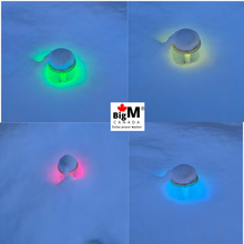 Load image into Gallery viewer, BigM RGB Color Changing Solar Mushroom Lights are glowing beautifully in different colors in the snow

