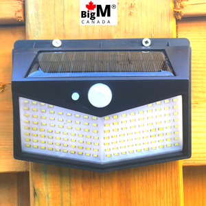 BigM  212 LED Best Solar Security Light With Motion Sensor installed on a 6X6" fence post