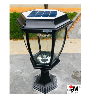 Image of a BigM 16” Elegant Looking LED Outdoor Solar Post Lights installed on a stone post